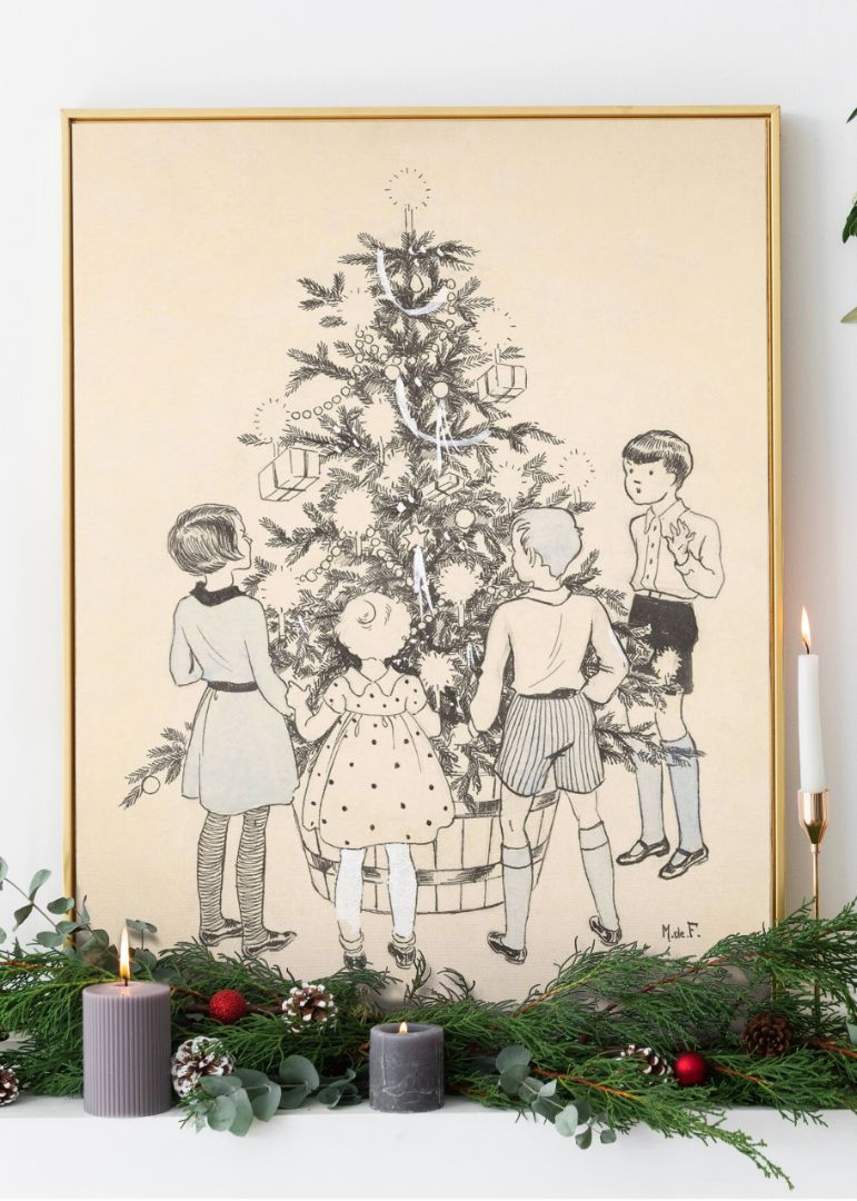 Four children around a Christmas tree