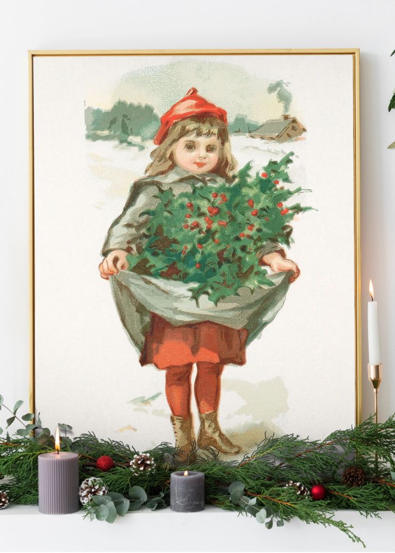 Little girl with holly