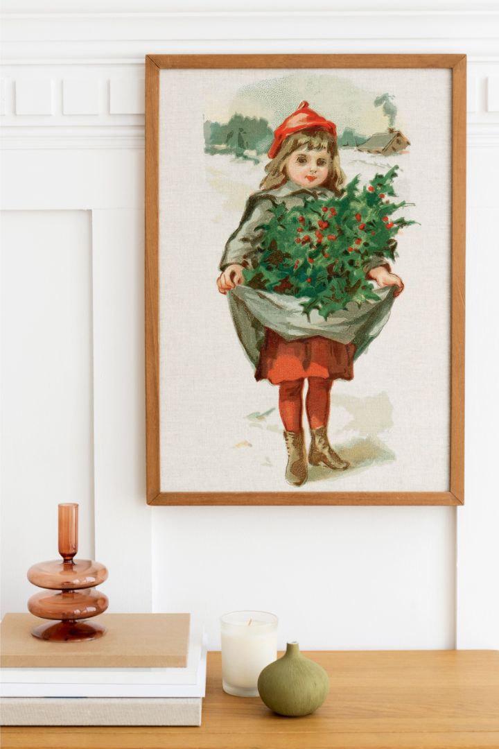 Little girl with holly