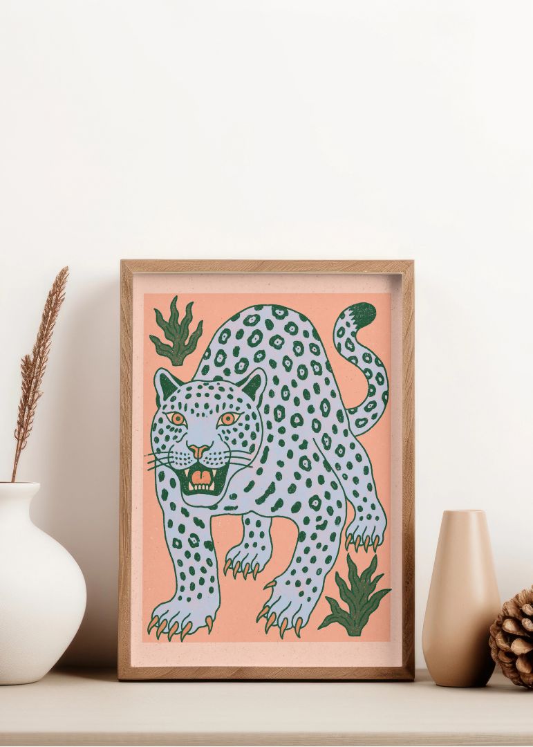 Lilla leopard på jagt