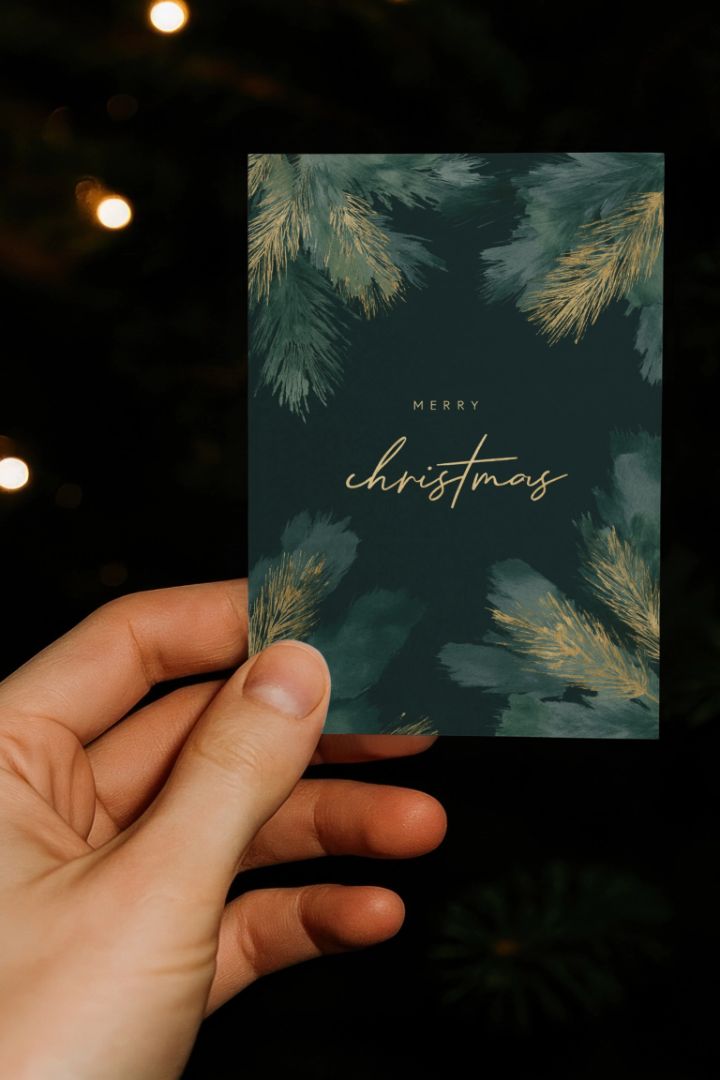 Mørkegrøn julehilsen med granguirlander