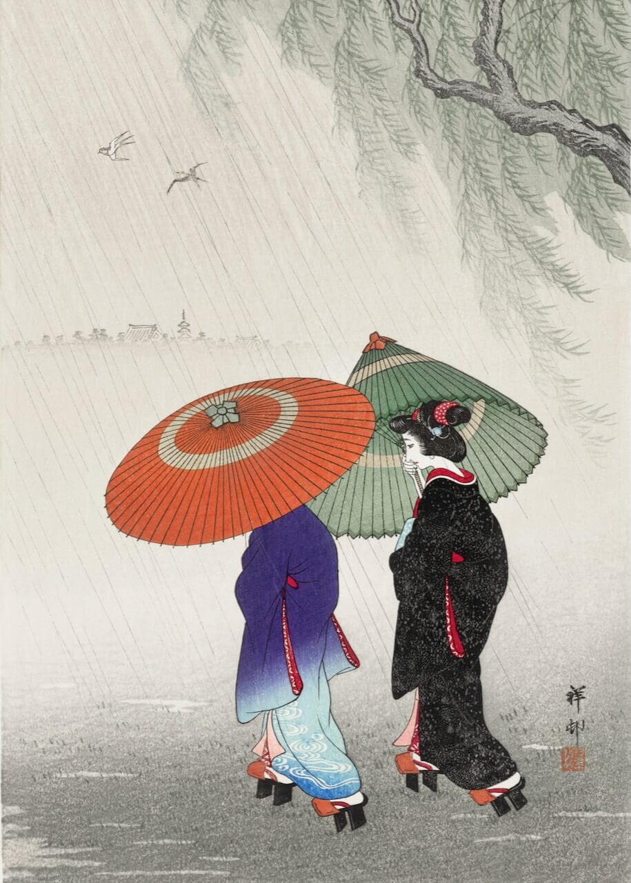 Two women in the rain